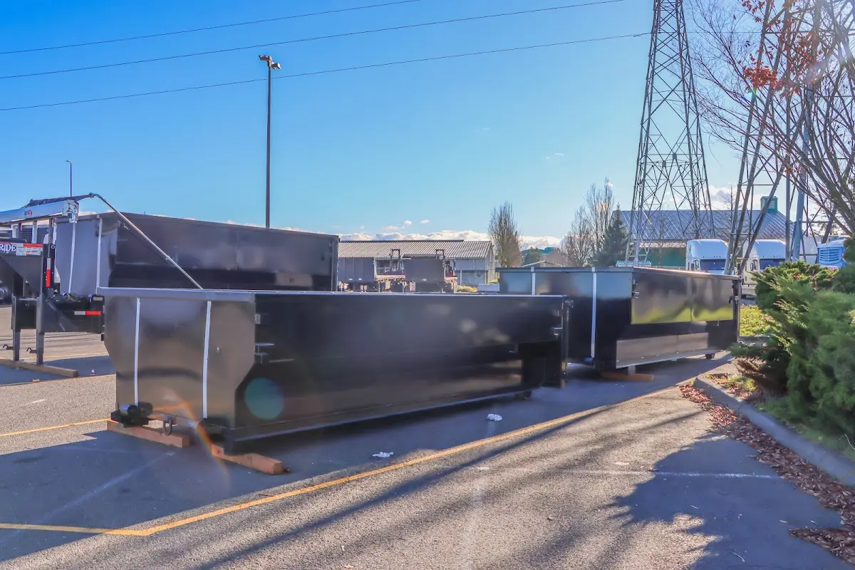 Roll-off dumpster ready for waste disposal at job site for Demolition Dumpster Rental in Wichita